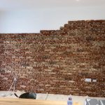 fitting brick cladding to a plastered kitchen wall